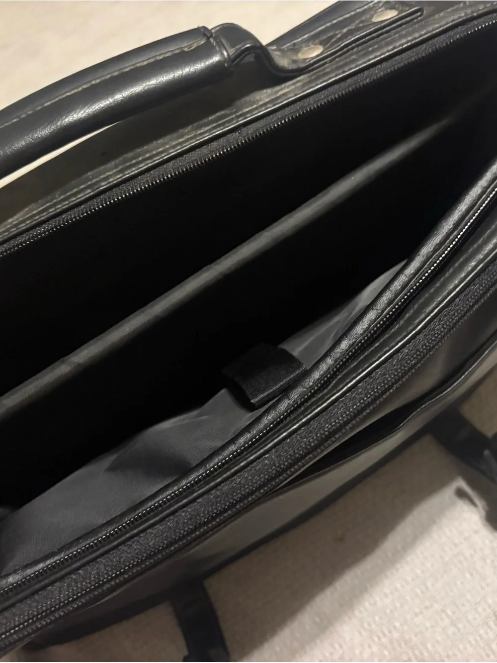 Rosetti Black Leather Messenger Briefcase with Buckle Accents